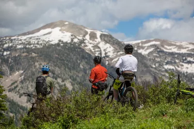 Ski Idaho This Summer: 60 percent of Idaho ski areas offer summer mountain biking adventures : Some mountain bikers take in the Tetons while they take a break from riding Grand Teton's renowned trails. Just across the border in Alta, Wyo., Grand Targhee affiliates with the Idaho Ski Areas Association because the resort is only accessible via Driggs, Idaho.