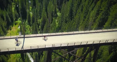 Ski Idaho This Summer: 60 percent of Idaho ski areas offer summer mountain biking adventures : The scenic Route of the Hiawatha, operated by Lookout Pass Ski and Recreation Area, winds through North Idaho's rugged Bitterroot Mountains along an abandoned section of the Milwaukee Railroad, traversing seven sky-high steel train trestles and delving 10 tunnels. 