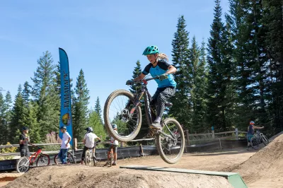 Ski Idaho This Summer: 60 percent of Idaho ski areas offer summer mountain biking adventures : A mountain biker catches some air at the grand opening of the Tamarack Resort Jump Park Aug. 7, 2020.